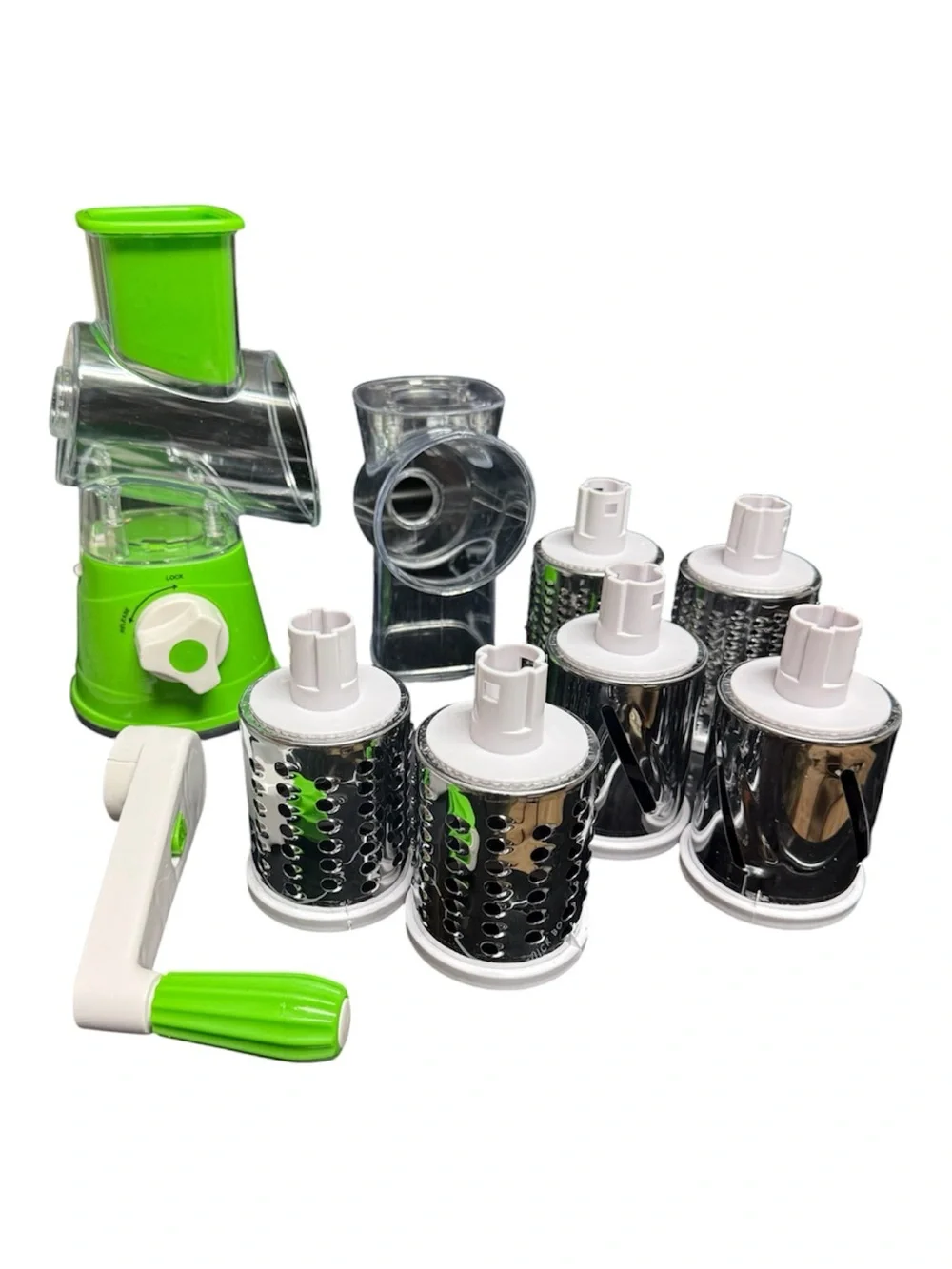 Tabletop Drummer Manual Green Vegetable Spiralizer and Grater with extra items.